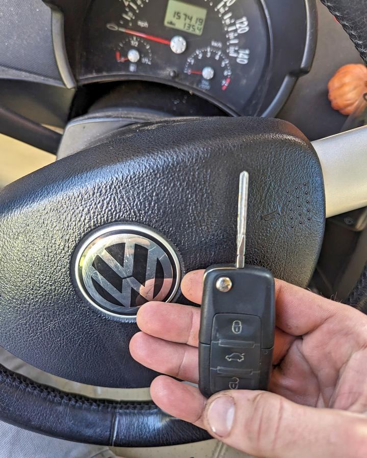 VW flip key at the steering wheel